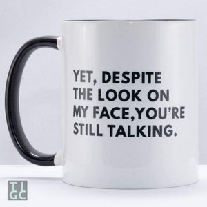 TIGC The Inappropriate Gift Co Despite the look on my face you're still talking? mug