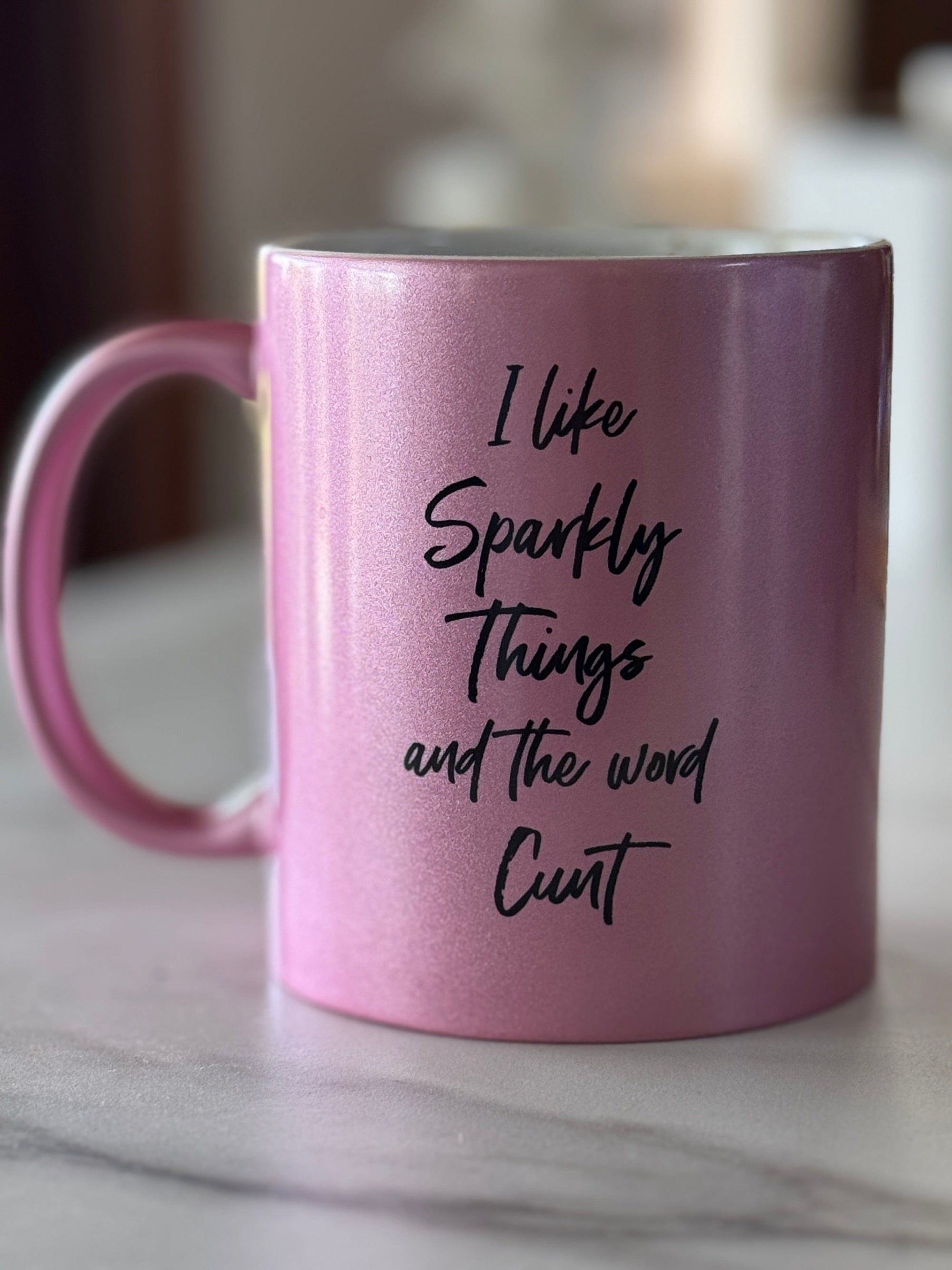 I like sparkly things and the word cunt mug