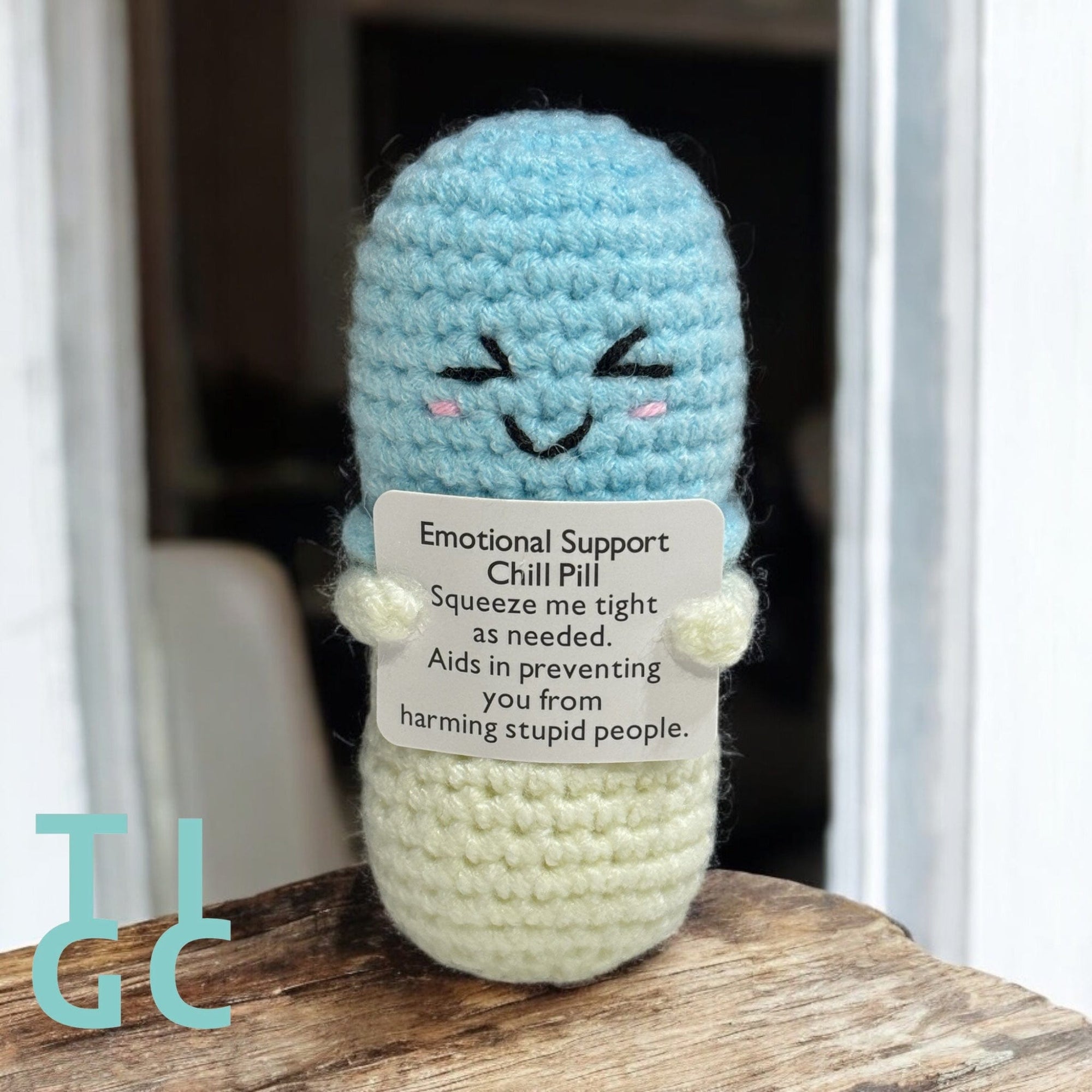 TIGC The Inappropriate Gift Co Positive Pill Crochet emotional support stuffed animal on white background 