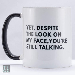 TIGC The Inappropriate Gift Co Despite the look on my face you're still talking? mug